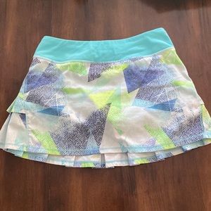 Ivivva girls size 12 skirt. With adjustable draw string and built in shorts.
